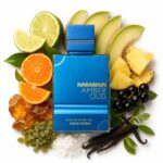 Amber Oud Aqua Dubai Al Haramain Extrait de Parfum Unisex con fondo de ingredientes