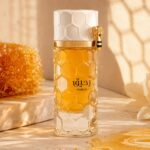 Fondo creativo de la botella Raheeq Nusuk Extrait de Parfum